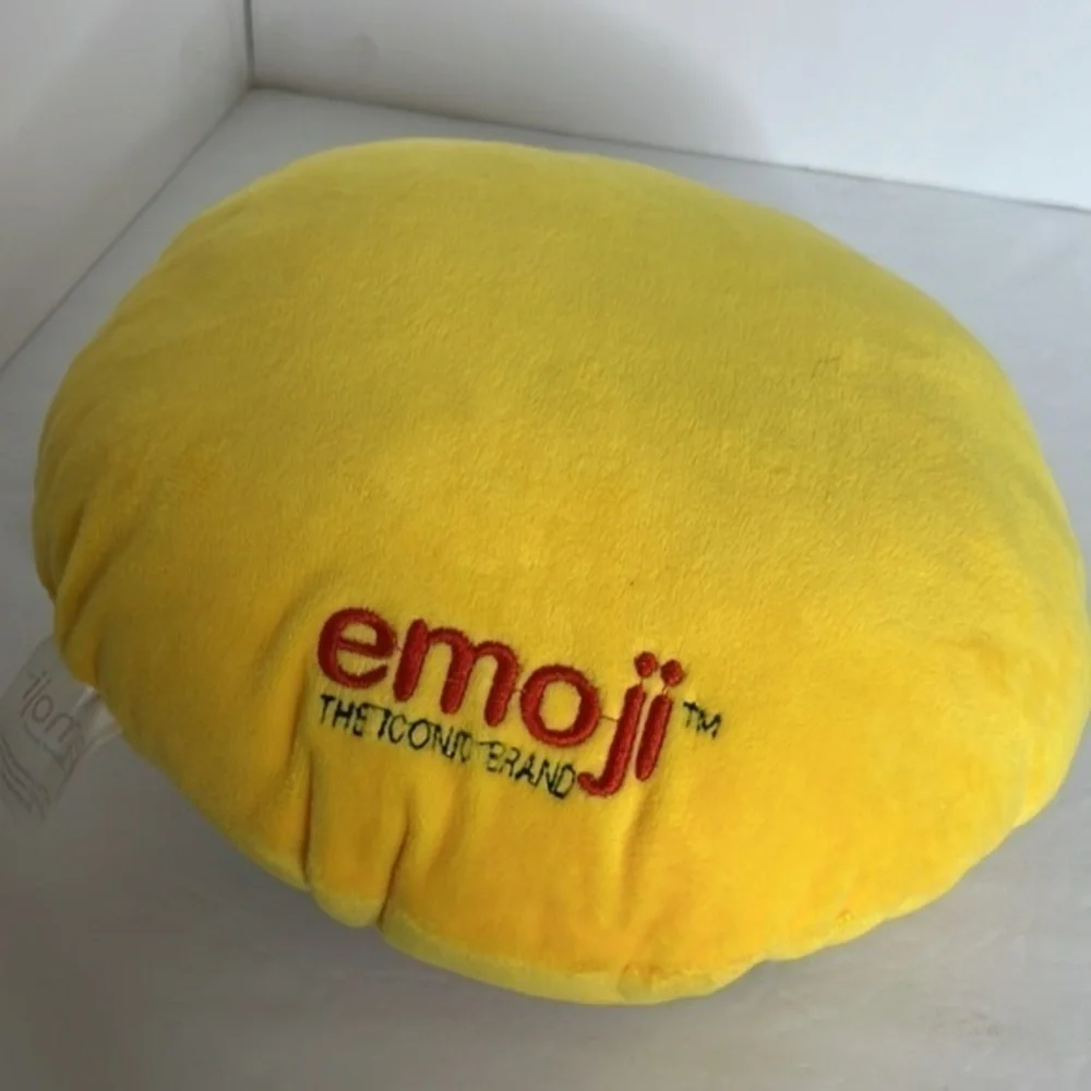 THE ICONIC BRAND EMOJI SMILE PILLOW WITH SUNGLASSES